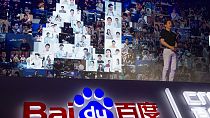 Robin Li, CEO of search giant Baidu, talks about AI during an event in Beijing, China,. 