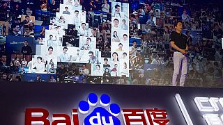 Robin Li, CEO of search giant Baidu, talks about AI during an event in Beijing, China,. 