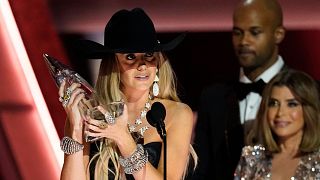 Lainey Wilson accepts the award for album of the year for "Bell Bottom Country" at the 57th Annual CMA Awards on Wednesday, 8 Nov 2023.