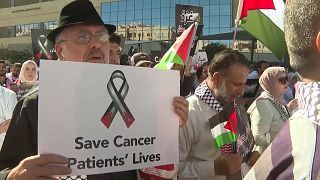 مظاهرة في الأردن تضامنا مع موظفي الصحة ومرضى السرطان في غزة. 2023/11/09