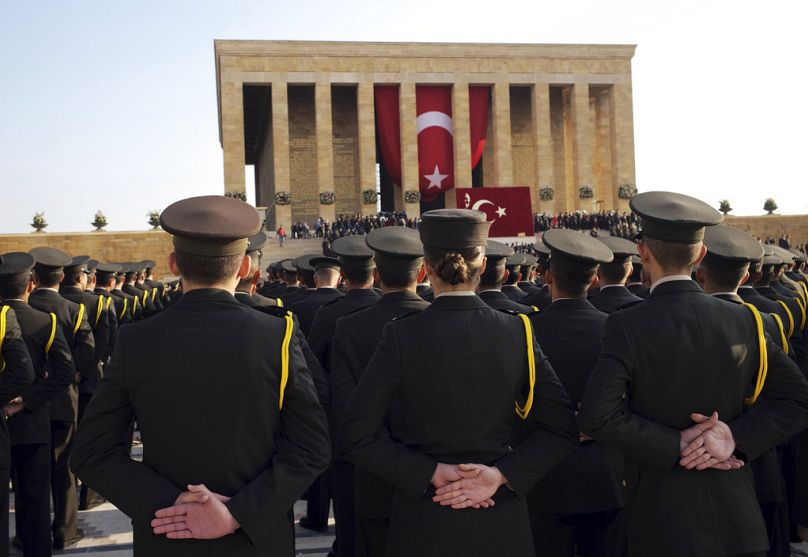 Young Turkish army officers stand at the mausoleum of the nation's founding father Mustafa Kemal Ataturk during a ceremony in Ankara, 10 November 2018