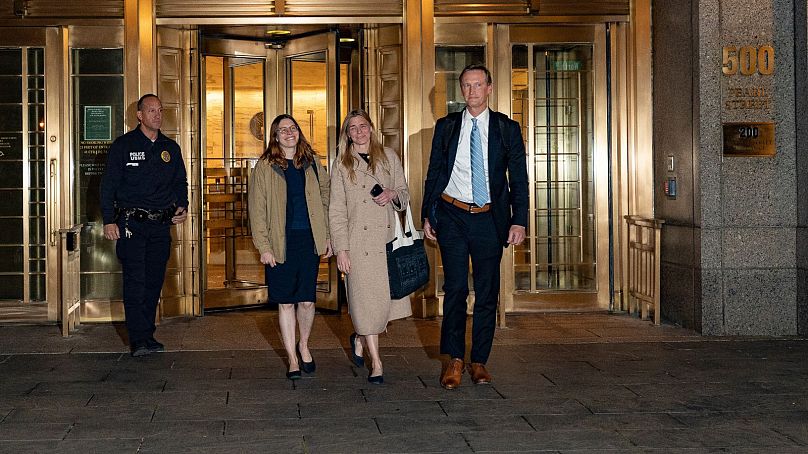 Graham Chase Robinson, center, and her attorneys Alexandra Hardin, center left, and Brent Hannafan, right, depart a federal courthouse in New York