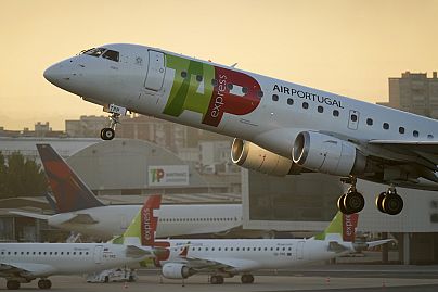 A TAP Air Portugal Embraer E190 takes off from Lisbon at sunrise, Thursday, Sept. 28, 2023.