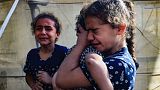  Children react during the funeral of the Faojo family, killed in Israeli bombing on Rafah in the southern Gaza Strip