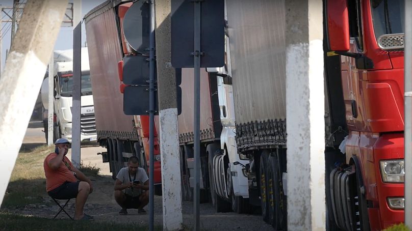 Truck drivers wait at the side of the road in a bottleneck trying to get access to Romanian port, September 2023