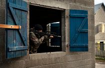 Ukrainian infantrymen train with French soldiers to learn combat skills, in France, Tuesday, Nov. 7, 2023. 