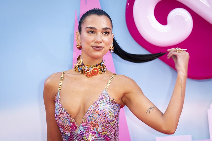 Dua Lipa poses for photographers upon arrival at the premiere of the film 'Barbie' on Wednesday, July 12, 2023, in London.