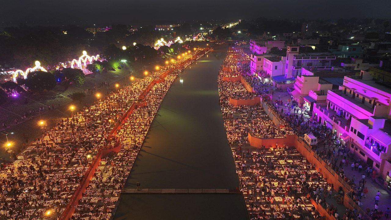 Lamps light up the banks of the river Saryu on the eve of the Hindu festival of Diwali, in Ayodhya, India, Saturday, Nov. 11, 2023.
