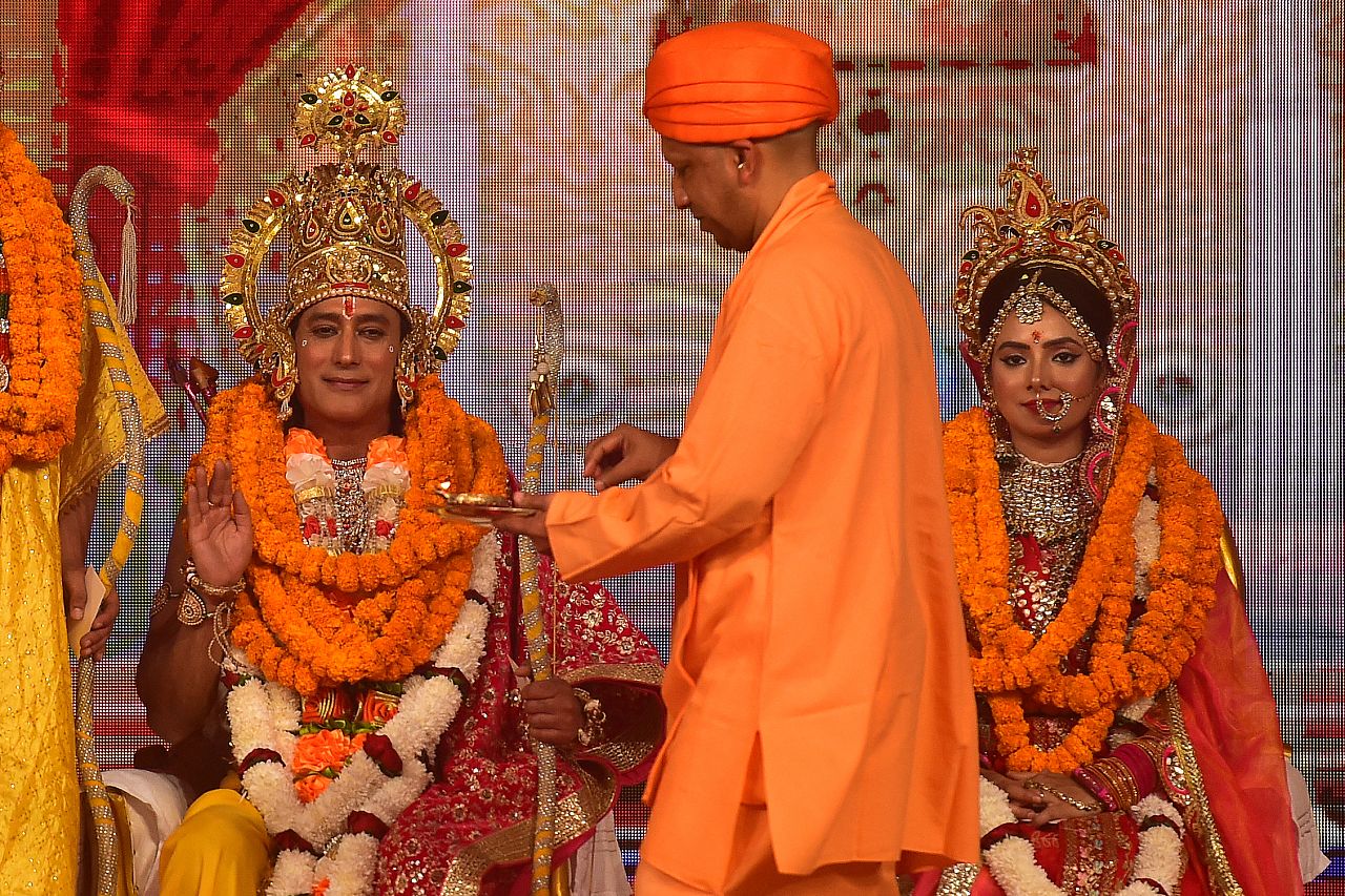 Chief Minister of Uttar Pradesh state Yogi Adityanath takes part in a religious event on the eve of 'Diwali', the Hindu festival of lights, in Ayodhya on November 11, 2023.