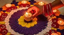 Streets and homes across the world were aglow Sunday night as millions of people celebrated Diwali, the Hindu festival of lights.