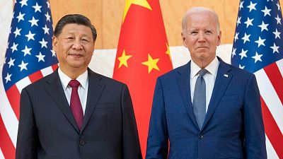 U.S. President Joe Biden, right, stands with Chinese President Xi Jinping before a meeting on the sidelines of the G20 summit on Nov. 14, 2022, in Bali, Indonesia.