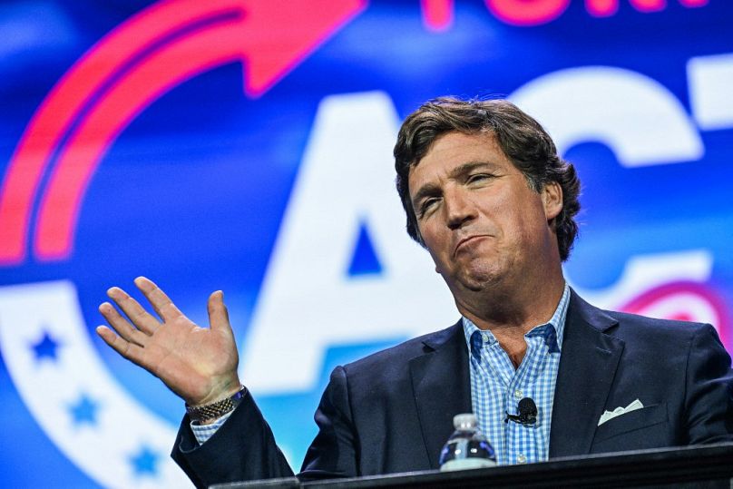 US conservative political commentator Tucker Carlson speaks at the Turning Point Action USA conference.