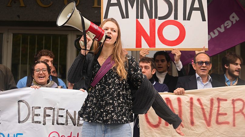 Law students at Madrid's Complutense University protest against acting Spain's Prime Minister Pedro Sanchez's amnesty deal