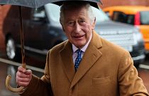 Britain's King Charles III reacts as he arrives to attend the launch of "The Coronation Food Project" .