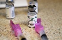 A chickenpox (also known as varicella) vaccine sits next to syringes and ready for a student at a free immunization clinic at a Seattle public school on Dec. 30, 2019, Seattle