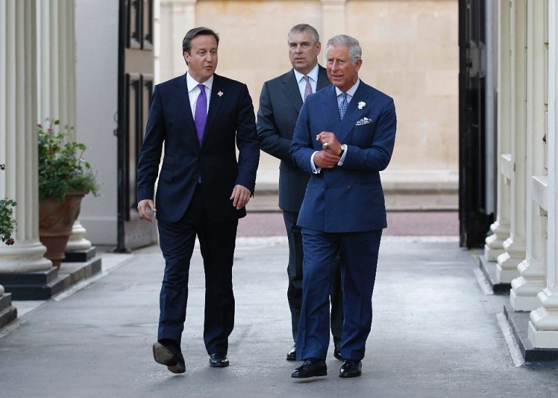 David Cameron, András herceg és Károly herceg, akkor még trónörökösként, 2012-ben