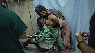 Palestinians wounded in Israeli bombardment of the Gaza Strip are brought to a hospital in Khan Younis, Wednesday, Nov. 15, 2023.