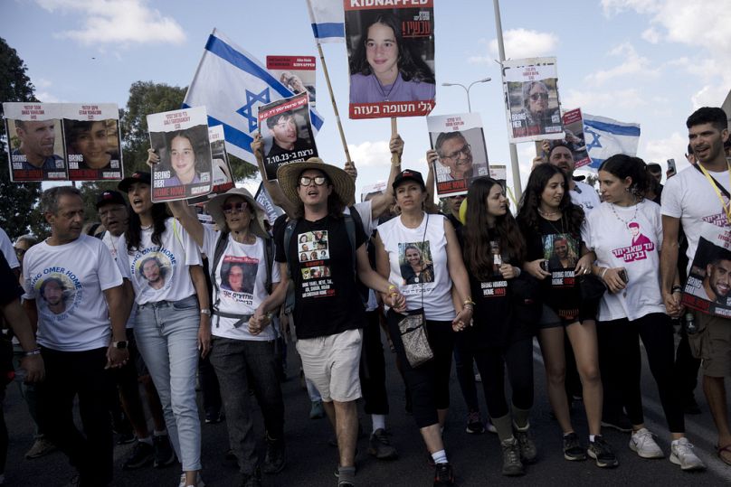 Families of hostages held by Hamas in the Gaza Strip since Oct. 7 and their supporters march from Tel Aviv to Jerusalem in Ramle, Israel, Wednesday, Nov. 15, 2023.