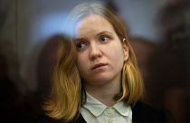 Suspect Darya Trepova stands in a glass cage as she attends a court hearing in the 1st Western District Military Court, in St. Petersburg, Russia on Wednesday