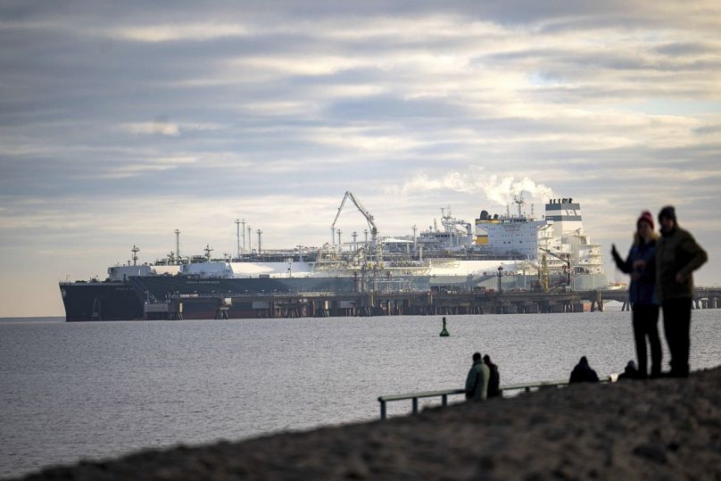 The tanker Maria Energy, left, loaded with liquefied natural gas, is moored at the floating terminal Hoegh Esperanza, in Wilhelmshaven, January 2023