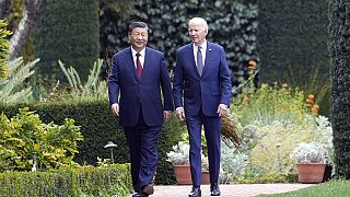 President Joe Biden and China's President President Xi Jinping walk in the gardens at the Filoli Estate in Woodside, Calif., Wednesday, Nov, 15, 2023