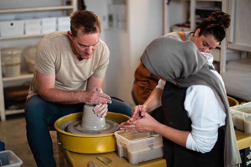 Reema guides hands and hearts in her ceramic design studio in Doha, Qatar