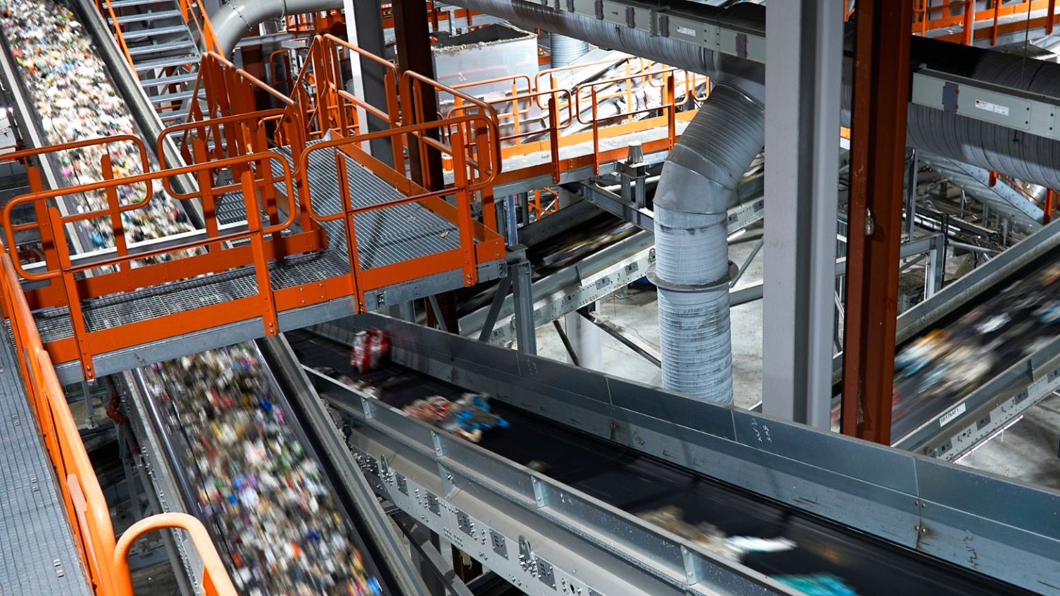 Plastic waste runs on conveyor belts at a new plastic waste sorting facility in Motala, central Sweden, 9 November 2023.