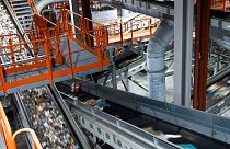Plastic waste runs on conveyor belts at a new plastic waste sorting facility in Motala, central Sweden, 9 November 2023.