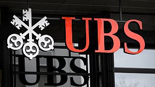  Логото на швейцарската мултинационална капиталова банка UBS. 