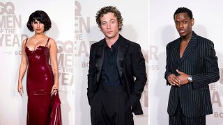 RAYE, Jeremy Allen White and Micheal Ward pose for photographs at the GQ Men of the Year Awards in London