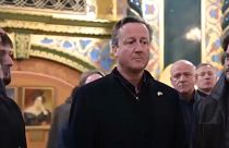 Le nouveau chef de la diplomatie britannique David Cameron en la cathédrale d'Odessa, Ukraine, jeudi 16 novembre. 