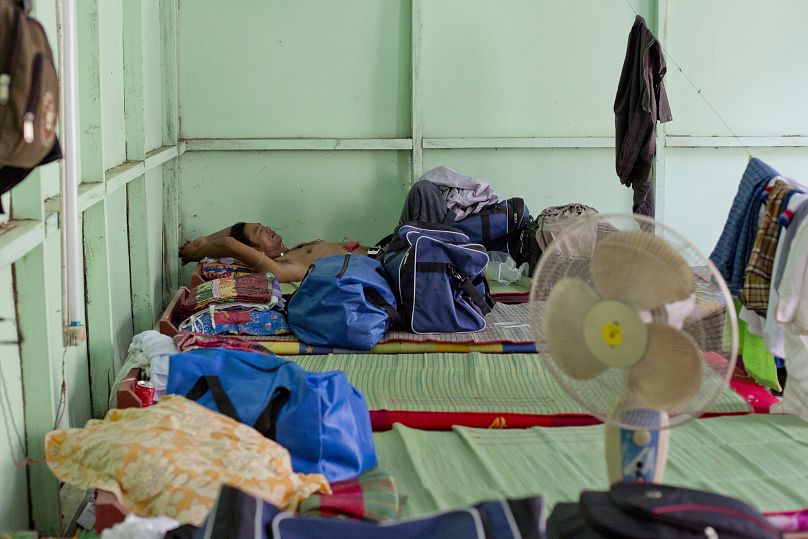 A former slave fisherman who spent more than two decades in Indonesia after being enslaved on Thai fishing boats, rests at a government welfare hostel in Myanmar in 2015