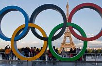 Image shows the Olympic rings with the Eiffel Tower in the background. New security technology was displayed in Paris ahead of the 2024 Games.