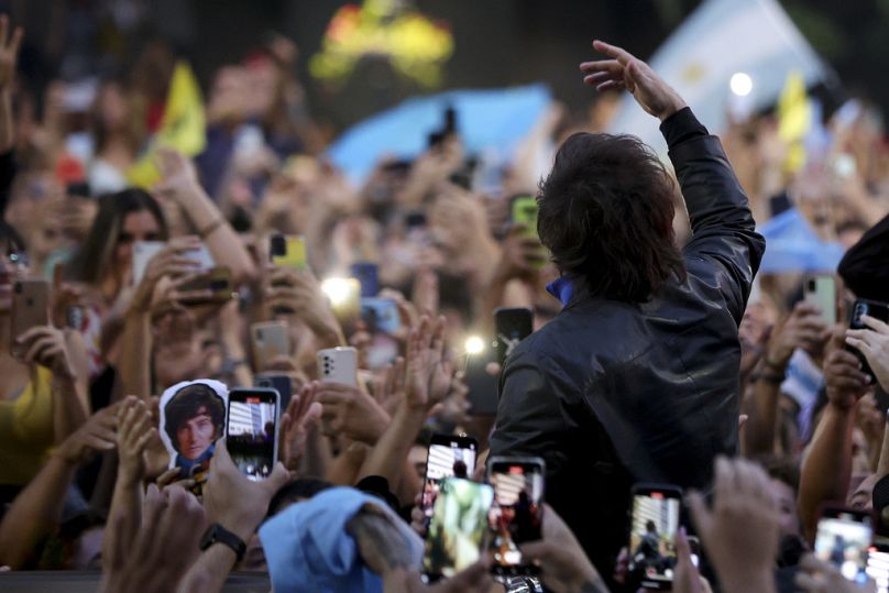 Javier Milei, Liberty Advances coalition presidential candidate, right, greets supporters during his closing campaign rally in Cordoba, November 2023