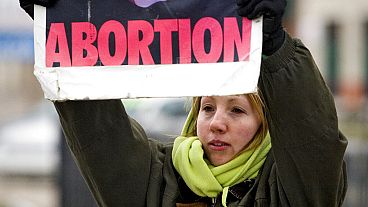 FILE - A protesters outside a women's health care service clinic in the US, 2008. 