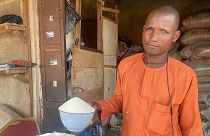 Isa Ahmed sells sugar at his shop at a market in Abuja, Nigeria: Sugar worldwide is trading at the highest prices since 2011.