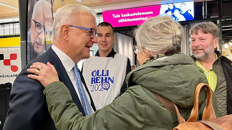 Centre Party candidate Olli Rehn meets voters at a shopping mall, November 2023