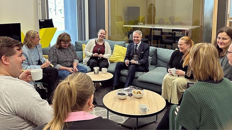 Green League candidate Pekka Haavisto (centre) meets voters, 2 November 2023