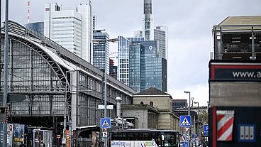 A bus turns on a street outside the main railway station and banking district in Frankfurt am Main, western Germany, on November 20, 2023.