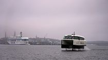 A new P-12 electric hydrofoil passenger vessel slices through the water in Stockholm’s archipelago, Sweden.