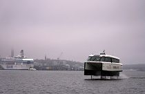 A new P-12 electric hydrofoil passenger vessel slices through the water in Stockholm’s archipelago, Sweden.
