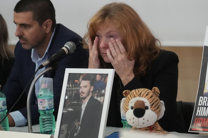 Evgenia Kozlo, whose son was taken hostage by Hamas, gets emotional during a press conference at the Italian Jewish Center in Rome, Wednesday, Nov. 22, 2023.