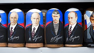 FILE In this file photo taken on Wednesday, Dec. 2, 2015, Russian traditional wooden matryoshka dolls showing Russian President, Vladimir Putin.