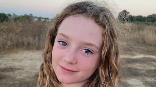 This September 2023 photo shows Emily Hand near Kibbutz Be’eri, Israel. Emily is believed to be among the hostages taken by Hamas militants in their incursion into Israel 