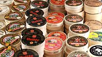 This picture taken on February 22, 2020 shows different packs of raw cow's milk "Camembert de Normandie” French cheese.