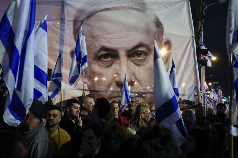 Israelis protest against plans by Prime Minister Benjamin Netanyahu's government to overhaul the Israel's judicial system, in Tel Aviv, March 2023