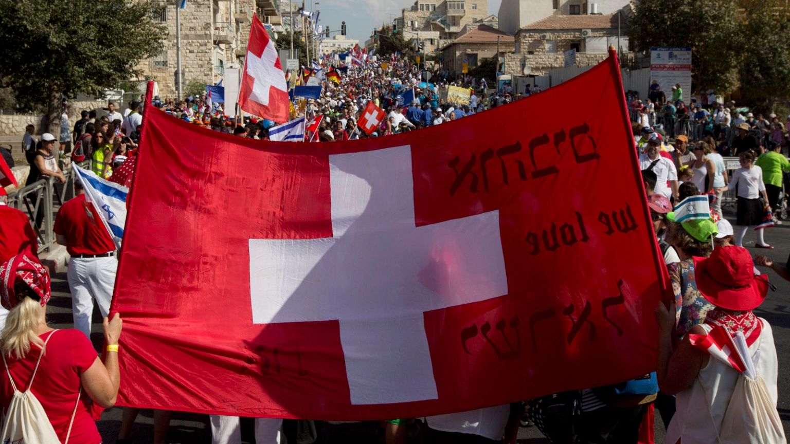 FILE: Evangelical Christians from various countries wave flags as they march to show their support for Israel in Jerusalem, Thursday, Oct. 1, 2015. 