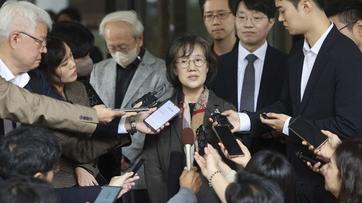 Professor Park Yu-ha answers reporters' questions outside the Supreme Court of Korea in Seoul, South Korea.