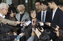 Professor Park Yu-ha answers reporters' questions outside the Supreme Court of Korea in Seoul, South Korea.
