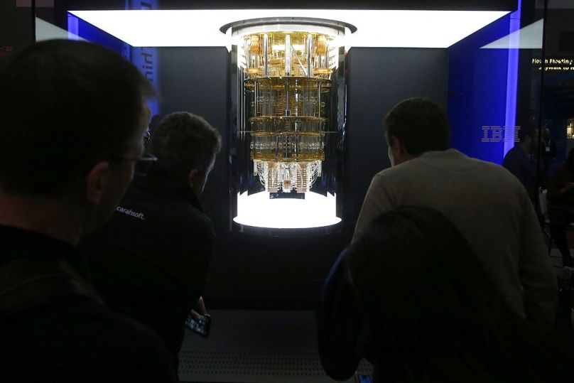 CES patrons take a look as IBM unveils its quantum computer, Q System One, shown in Las Vegas, January 2020